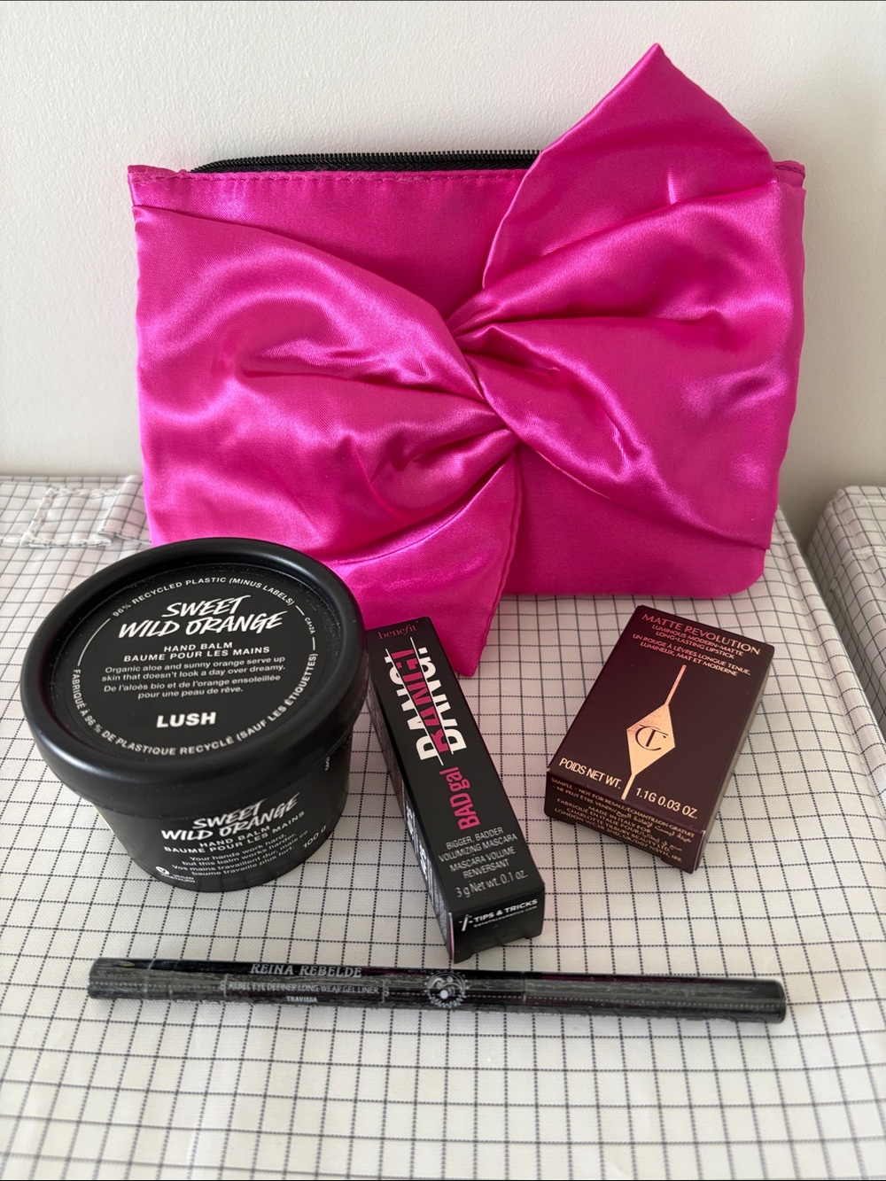 Kit w/mini makeup accessory bag, benefit Bad Girl mascara 0.1oz LUSH hand balm +